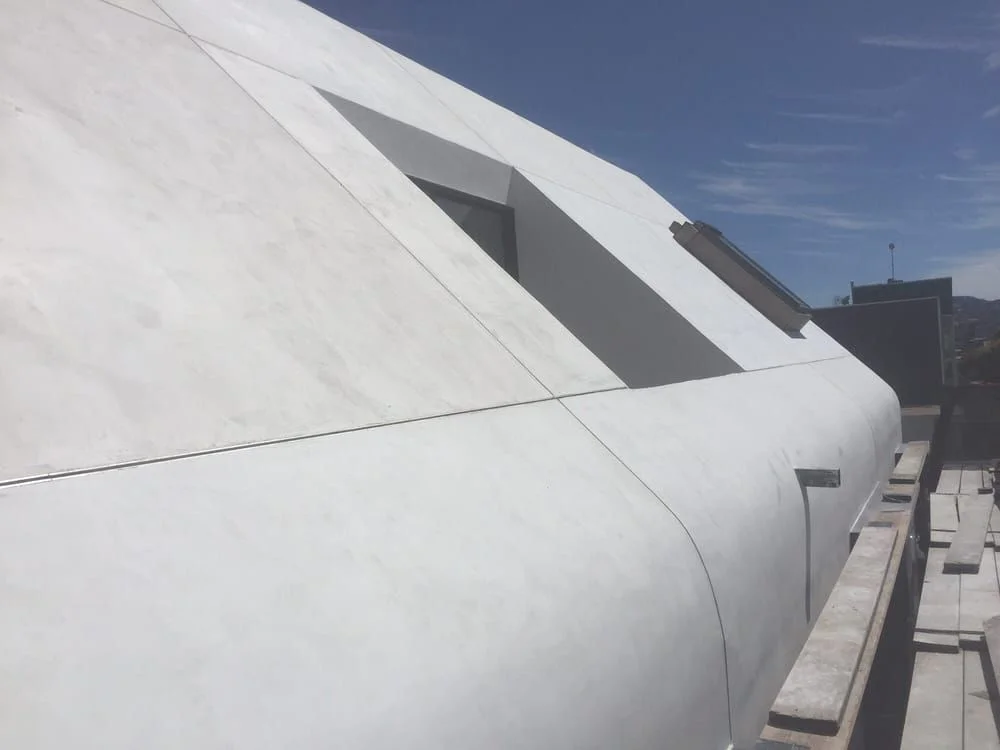 Curved smooth exterior plaster detail by McKenna Plastering